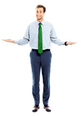 Comparison concept - businessman or bank employee in green tie showing, holding or giving something on both flat hands for similar choice isolated over white background. Copy space for text. Full body
