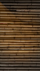 old brown tone bamboo plank fence texture for background
