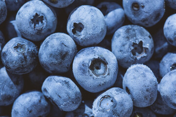 Frozen blueberry fruits, organic and vegan food. berries background. close up, top view