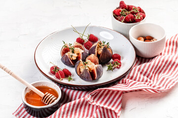 Delicious dessert made with figs fruit, cheese, nuts and honey. appetizer, ideal as an aperitif