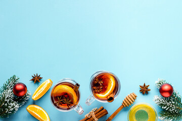 Christmas mulled wine with spices and oranges - winter hot drink