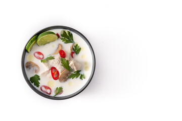 Traditional Thai food Tom Kha Gai in bowl isolated on white background. Top view.Copy space
