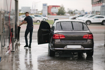 Clean car on self car washing. Wet car after washing