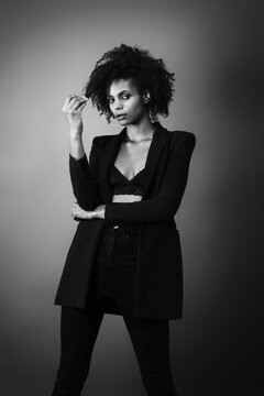 Portrait of a young afro woman wearing a blazer