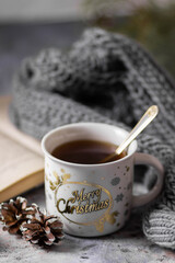 A white Cup with the words 