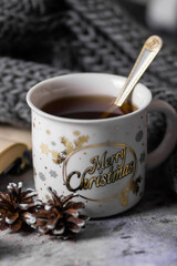 A white Cup with the words 