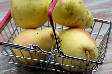close-up pears in a basket