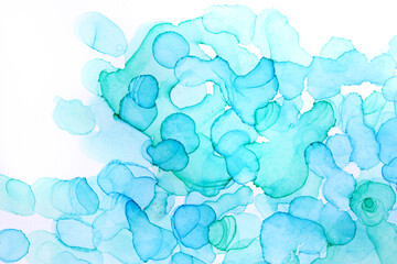 Transparent blue handdrawn watercolor drops on white background. Bubbles imitation.