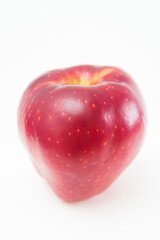 Fototapeta na wymiar Top view of red richard apple against white background