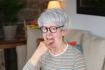 Senior woman with some nausea 