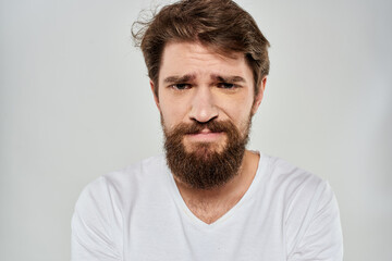 Obraz premium emotional bearded man close-up facial expression studio lifestyle