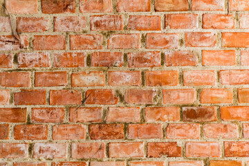 Old brick wall of a building, background, texture, pattern.