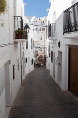Beautiful street of white houses in the town of Mojacar in Almeria on the Mediterranean Sea, in Cabo de Gata, in Spain.