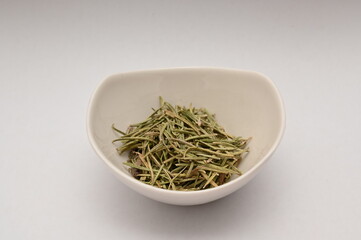 Dried rosemary on isolated white background