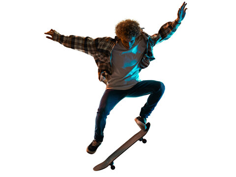 one cauacsian young man skateboarder Skateboarding in studio silhouette shadow isolated on white background