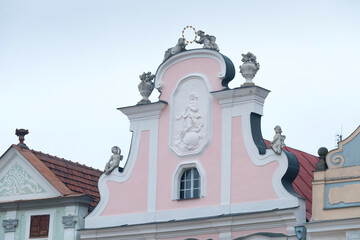 Traditional houses on the main square of Telc, South Moravia, Czech Republic. UNESCO heritage site. Town square in Telc with renaissance and baroque colorful houses. Details of windows and gables.