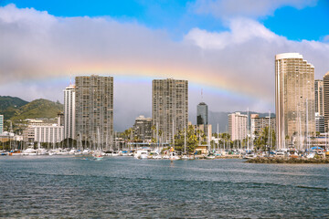 Fototapeta na wymiar Rainbow over Ala Wai Boat Harbor, Honolulu, Oahu, Hawaii