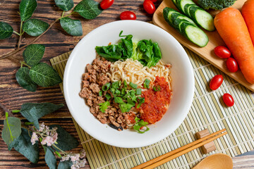 Yunnan-Style Noodle with Pork, This tangle of cold noodles and vegetables in a sweet, sour, and savory sauce.