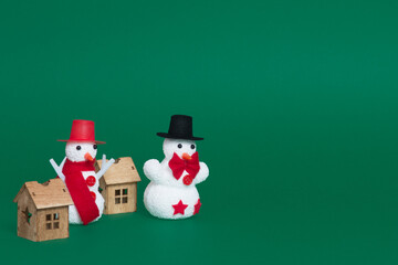 christmas decorations on colorful background with snow man