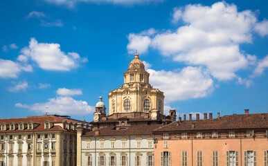 Fototapeta na wymiar Perspective on the elegant Saint Lawrence church in Turin with a blue sky