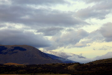 Cloudy sky on snow-covered peaks, Apennines mountains, Abruzzo, Italy 