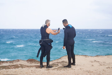 two divers taking a selfie