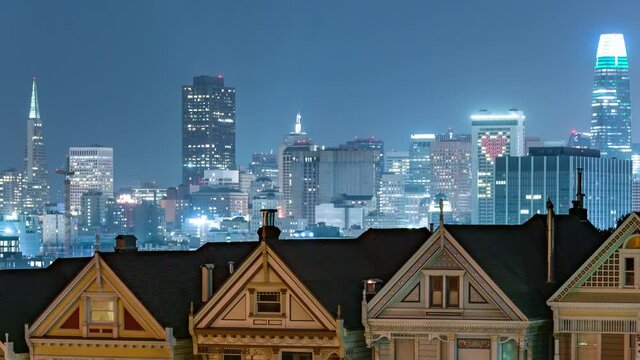 San Francisco Downtown Skyline and Painted Ladies at Alamo Square Night Time Lapse California USA