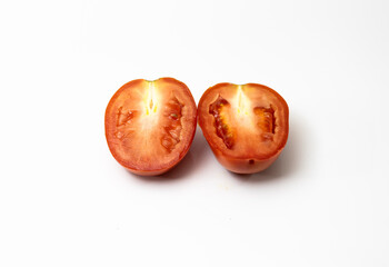 Front view of sliced tomato on white background