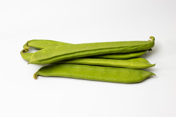 Organic green beans bundle on white isolated background
