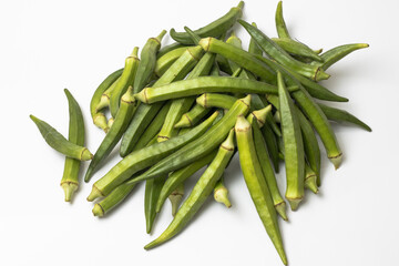 Organic okra vegetable on white background