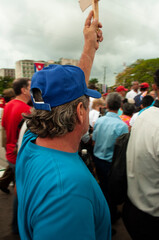 Fototapeta na wymiar Man raising his hand in a peaceful manifestation