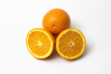 Round sliced orange fruit on white background isolated