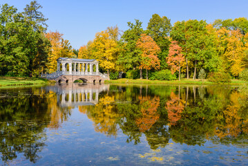 Fototapeta na wymiar Sightseeing of Saint Petersburg. Marble bridge and Catherine Park, beautiful autumn landscape, Pushkin (Tsarskoe Selo), Russia