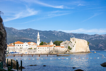 Old town by the sea against the background of the mountains. Montenegro, Budva