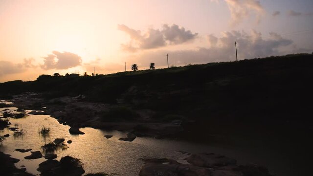Scenic view of beautiful sunrise at river. at Khari river in bhuj, Kutch, India.