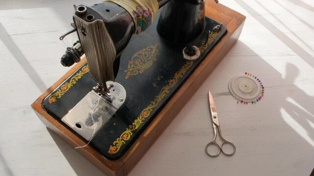 Old retro sewing machine, the camera moves and shows it from different angles. 4K