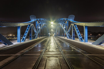 Krakow Poland, Pilsudski bridge over Vistula river in the night