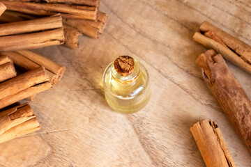 Essential oil bottle with Ceylon cinnamon sticks