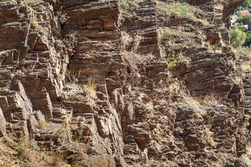 Natural rock texture in sunlight
