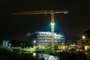 Building site with crane in new housing estate 