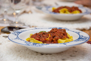 Pappardelle Pasta with meat rag. Typical dish of Tuscany.
