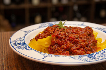 Pappardelle Pasta with meat rag. Typical dish of Tuscany.