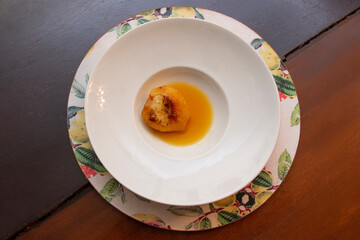 Dessert of pear brulee with dolce gorgonzola cheese