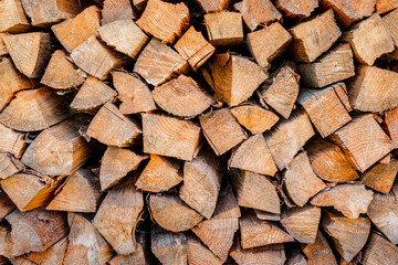 wall firewood , Background of dry chopped firewood logs in a pile. Firewood texture. Stack of dry chopped wooden logs. natural wooden background with timber. log wall.
