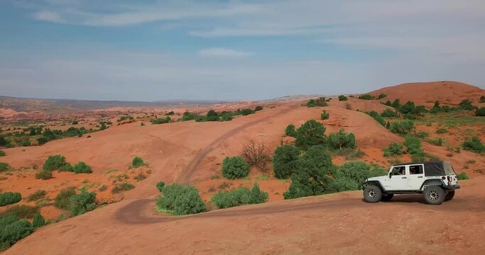Off-roading Vehicle Driving in the Beautiful Deserts of Moab Utah