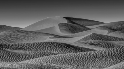 Black and white sand dunes in the Dubai - Powered by Adobe