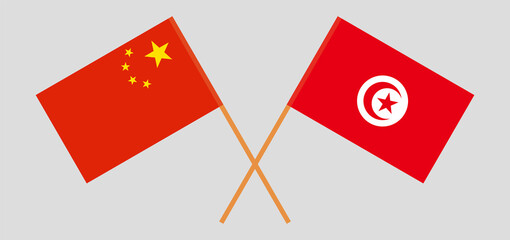 Crossed flags of Tunisia and China