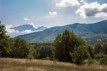 View of the area with wooded hills in the foothills
