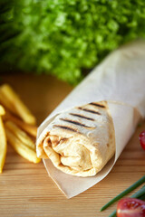 Classic pork shawarma in lavash, close-up. 