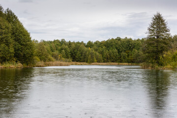 Morning autumn rain on a blue lake in Kazan. Russia.